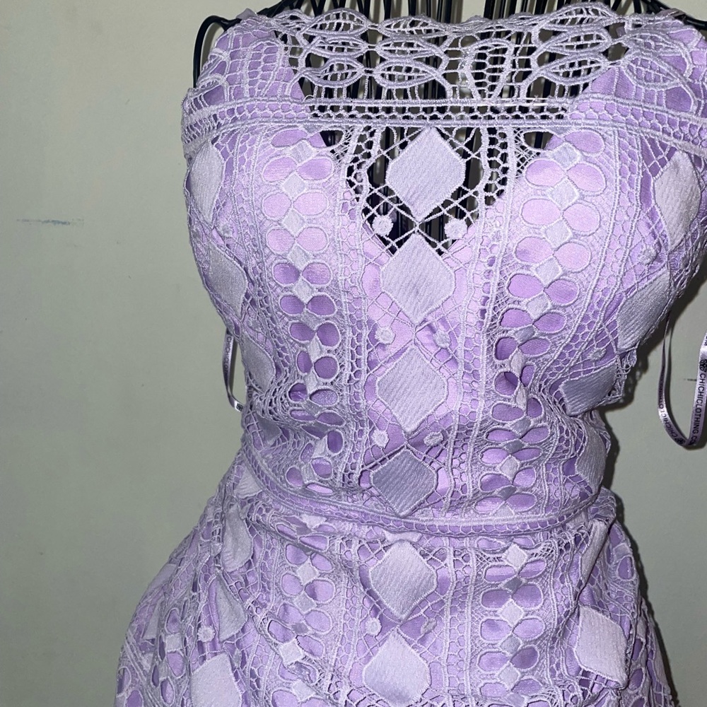 Cute dress with bra padding foral lacy and had a slit on the bottom back